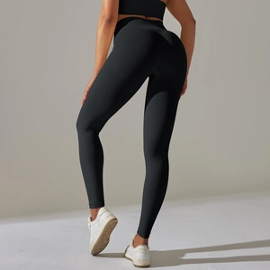 Close-up of black seamless leggings showing body-contouring lifting effect and knit texture