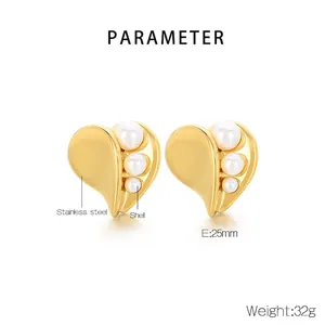 Macro view of heart-shaped steel earrings with dimensions 25mm and shell pearls