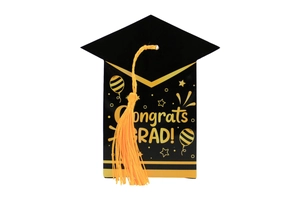 Detail view of black graduation candy box with gold Congrats GRAD text and yellow tassel