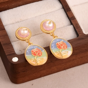 Baroque pearl earrings with rose oil painting pendant in a vintage wooden jewelry box