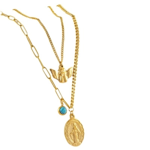 Gold layered necklace set with angel pendant, turquoise beads and oval religious medal