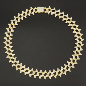 Hip hop style gold plated iced out cuban link chain bracelet with jagged thorn details