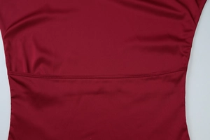 Detailed close-up of wine red slim fit tube top showing high quality fabric and stitching