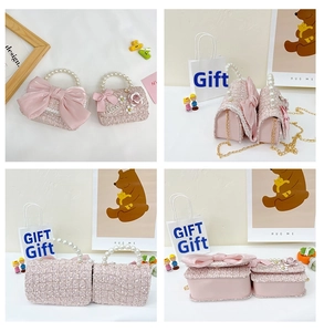 Detail view of pink tweed kids crossbody bag with pearl handle and bow decoration