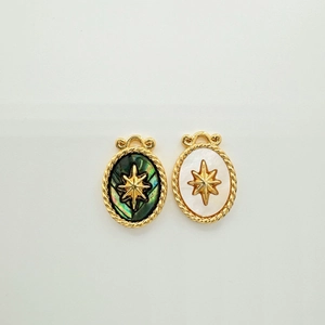 Star shell pendant in 18K gold plated frame with green and white oval accents