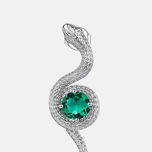 Elegant silver snake stud earrings with green emerald stone and detailed scales