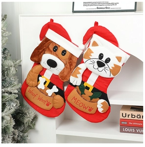 Detail of Christmas stockings with cute dog and cat designs hanging by a fireplace