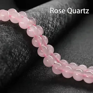 Natural rose quartz round beads with translucent pink texture for jewelry making
