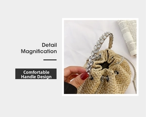 Detail magnification of comfortable rhinestone handle and straw drawstring bucket bag texture