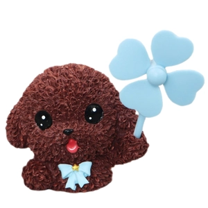 Cute brown toy dog car air vent clip with blue bowtie and lucky clover windmill decor