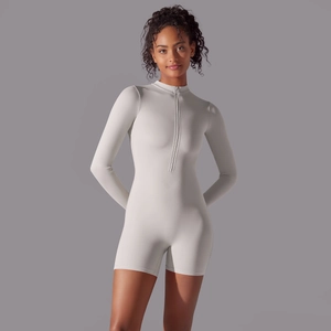 Close-up of flexible ribbed fabric and zip-up collar on women's athletic bodysuit