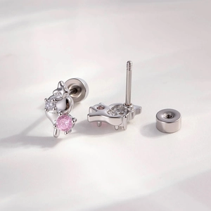 Pink zircon fox stud earrings with secure screw back design on textured surface