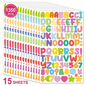Detail of 1350 colorful cartoon alphabet and number stickers in a stack of 15 sheets