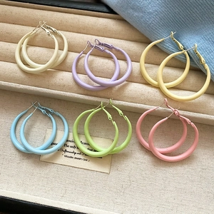 Set of 6 pairs colorful macaron hoop earrings neatly displayed in a beige jewelry box