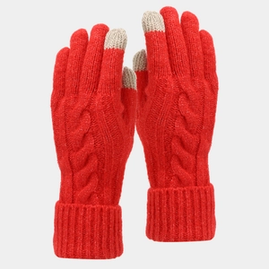 Detail of red cable-knit touchscreen gloves with white fingertips and ribbed cuffs