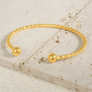 Adjustable 18k gold plated stainless steel open bangle with rhombus texture and gold beads