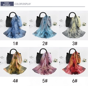 Detailed color display of six floral printed chiffon scarves with various artistic patterns