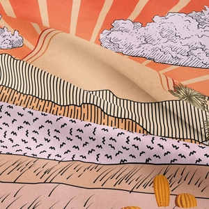 Detailed close-up of Bohemian sun and cactus tapestry fabric with textured fiber finish