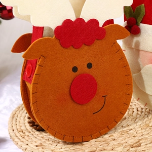 Christmas reindeer felt gift handbag with festive red straps and warm holiday decor