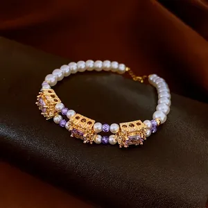 French retro bracelet with white pearls, purple square zircon and gold-plated hardware