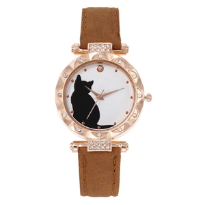 Detailed macro view of a rose gold watch featuring a cat dial and sparkling crystal bezel
