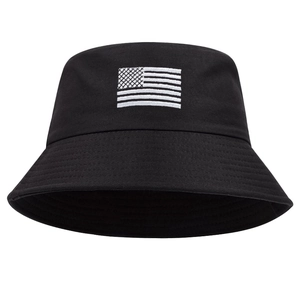 Close-up of American flag embroidery and reinforced stitching on black bucket hat