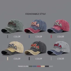 Vintage washed cotton baseball cap with HOLA embroidery and distressed brim details