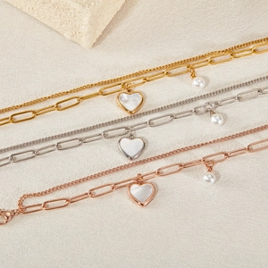 Double-layered stainless steel bracelet with heart shell and pearl pendants in three colors
