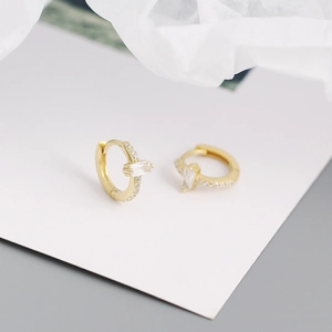Detail of s925 silver hoop earrings with rectangular zircon and 18K gold plating