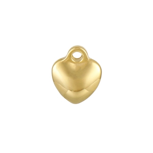 Close-up of a polished gold heart pendant with a metallic luster on a white background