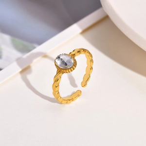 Twisted gold titanium steel open ring featuring a sparkling oval clear zircon stone