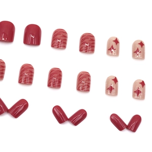 Summer berry red press-on nails set with tiger print and glitter star designs