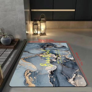 Detailed view of marble patterned diatom mud bath mat with gold accents in 50x80cm size
