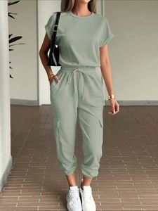 Women's light green casual two-piece set featuring short sleeve top and cargo jogger pants