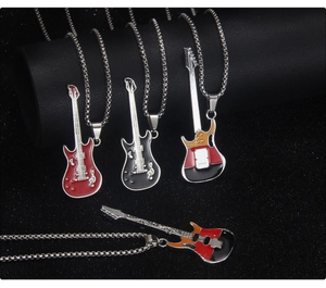 Detail of colorful enamel electric guitar pendants on stainless steel chains in four colors