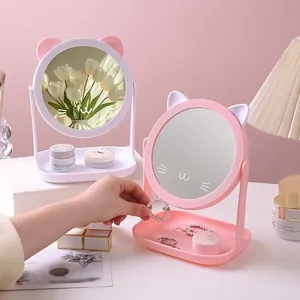 Desktop cat-ear makeup mirror with storage tray in pink and white colors