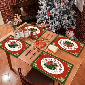 Set of four Christmas placemats with sled and gift boot design on a festive wooden table