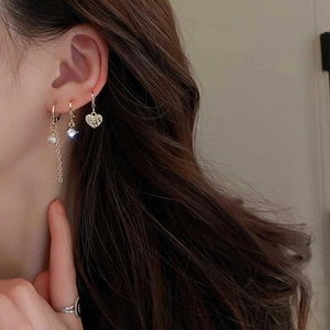 Gold-plated star moon pearl earrings set featuring tassel and heart studs on model