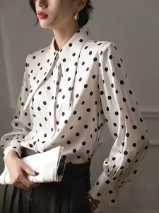 Elegant white polka dot silk shirt with lantern sleeves and classic lapel collar