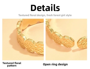 Detail shot of vintage golden flower ring showing hammered texture and adjustable open band