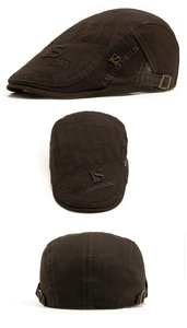 Detailed side view of brown cotton flat cap with embroidery and adjustable metal side buckle
