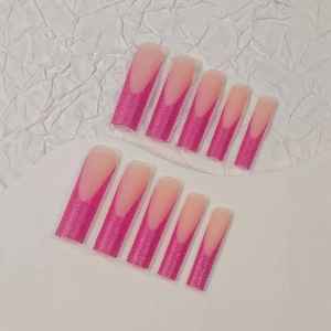 Extra long square French nails with pink glitter tips and nude base polish set