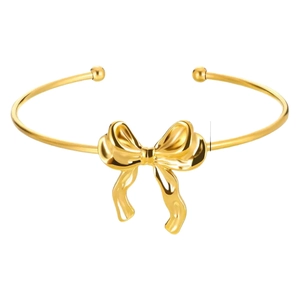 Bracelet jonc minimaliste en acier inoxydable doré avec un nœud et une finition polie