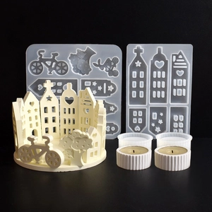Detail of DIY silicone molds for Easter house candle holders with intricate cutout patterns