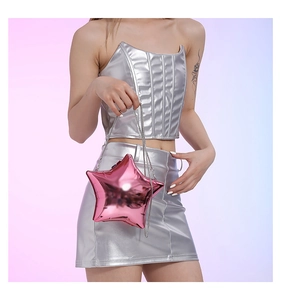 Close-up of a glossy pink star-shaped acrylic mini bag with a sleek metallic chain strap