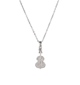 Close-up of silver violin pendant with sparkling white cubic zirconia inlay on chain