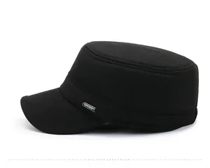 Detail of black men's military flat cap showing side SPORT metal tag and thick fabric