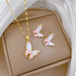 Elegant gold titanium steel butterfly necklace and earrings set with pink enamel inlay