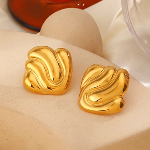 Polished 18K gold plated stainless steel geometric ripple stud earrings on a beige stand