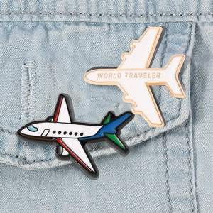 3D airplane enamel brooches in minimalist and colorful styles on denim fabric